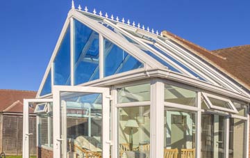 conservatory roof insulation costs Caer Estyn
